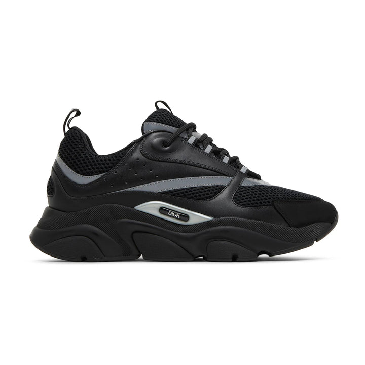 Black and gray sneaker on a white background