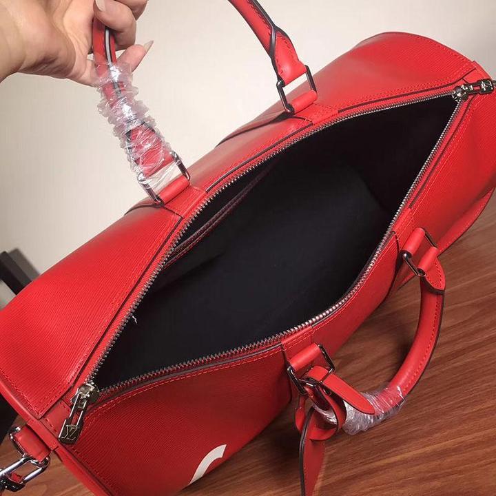 LOUIS VUITTON X SUPREME - TRAVEL BAG